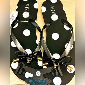 NWT FROM ESCA BLACK AND WHITE POLKA DOT WITH GOLD HEART/BOW CHARMS HARDWARE .